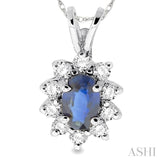 6x4MM Oval Cut Sapphire and 1/4 Ctw Round Cut Diamond Pendant in 14K White Gold with Chain