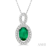 6x4 MM Oval Cut Emerald and 1/10 ctw Round Cut Diamond Pendant in 14K White Gold with Chain